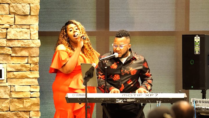 A vocalist and keyboardist performing