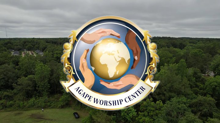 Agape Worship Center logo over an aerial tree line