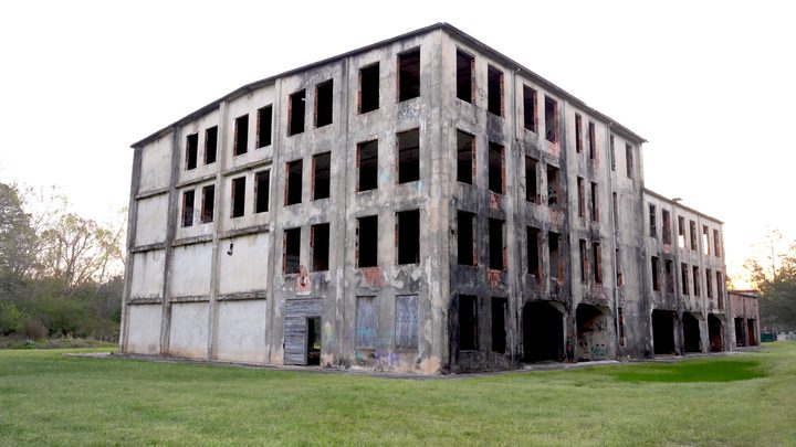 The abandoned building at the center of the film