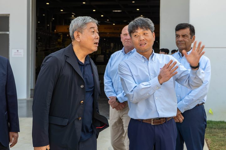 The CEO in conversation with plant leadership