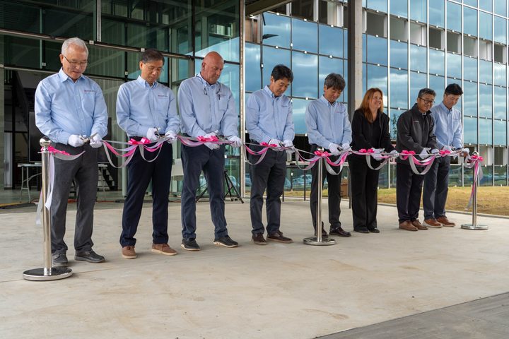 Executives cutting the ribbon at the new SECO ECOPLASTIC facility