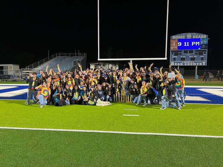 The Southeast Bulloch Swarm Marching Band celebrating on the field